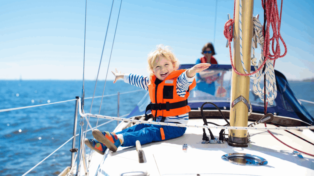 Kids sail on yacht in sea. Child sailing on boat.